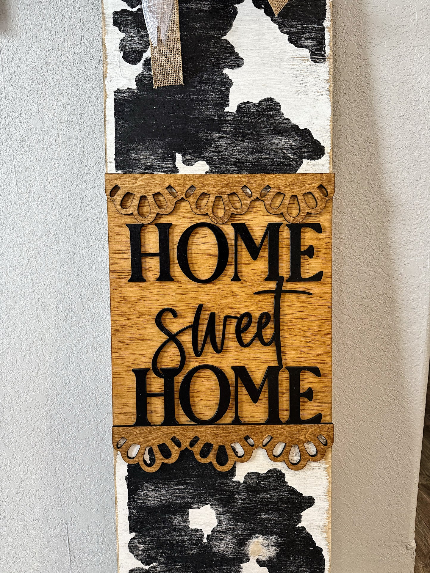 Distressed Cow Print Door Leaner